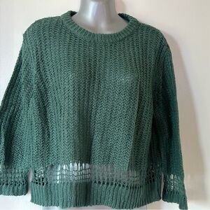 Wrap yourself in the cozy charm of this RVCA pullover sweater, size L